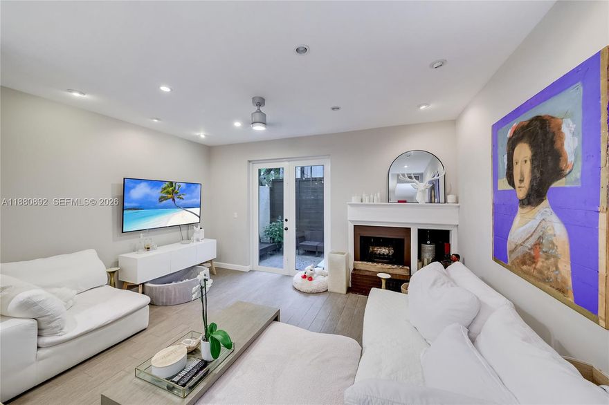 Welcome to this charming 2-story condo in the heart of Coconut Grove. Featuring 2 bedrooms and 1.5 bathrooms, this adorable unit blends comfort with thoughtful updates. The kitchen was updated with new cabinets in 2021, and the roof was replaced in 2023 for peace of mind. A cozy fireplace adds to the charm, while a wet bar makes entertaining a delight. Enjoy the convenience of an in-unit washer and dryer, plus two unassigned spaces in a gated parking lot. The private patio is perfect for relaxing outdoors, and the boutique building of only four units offers an intimate, quiet setting. Located near parks, marinas, shops, and dining, this move-in-ready condo captures the vibrant Coconut Grove lifestyle with ease. Leased until Nov 2026.