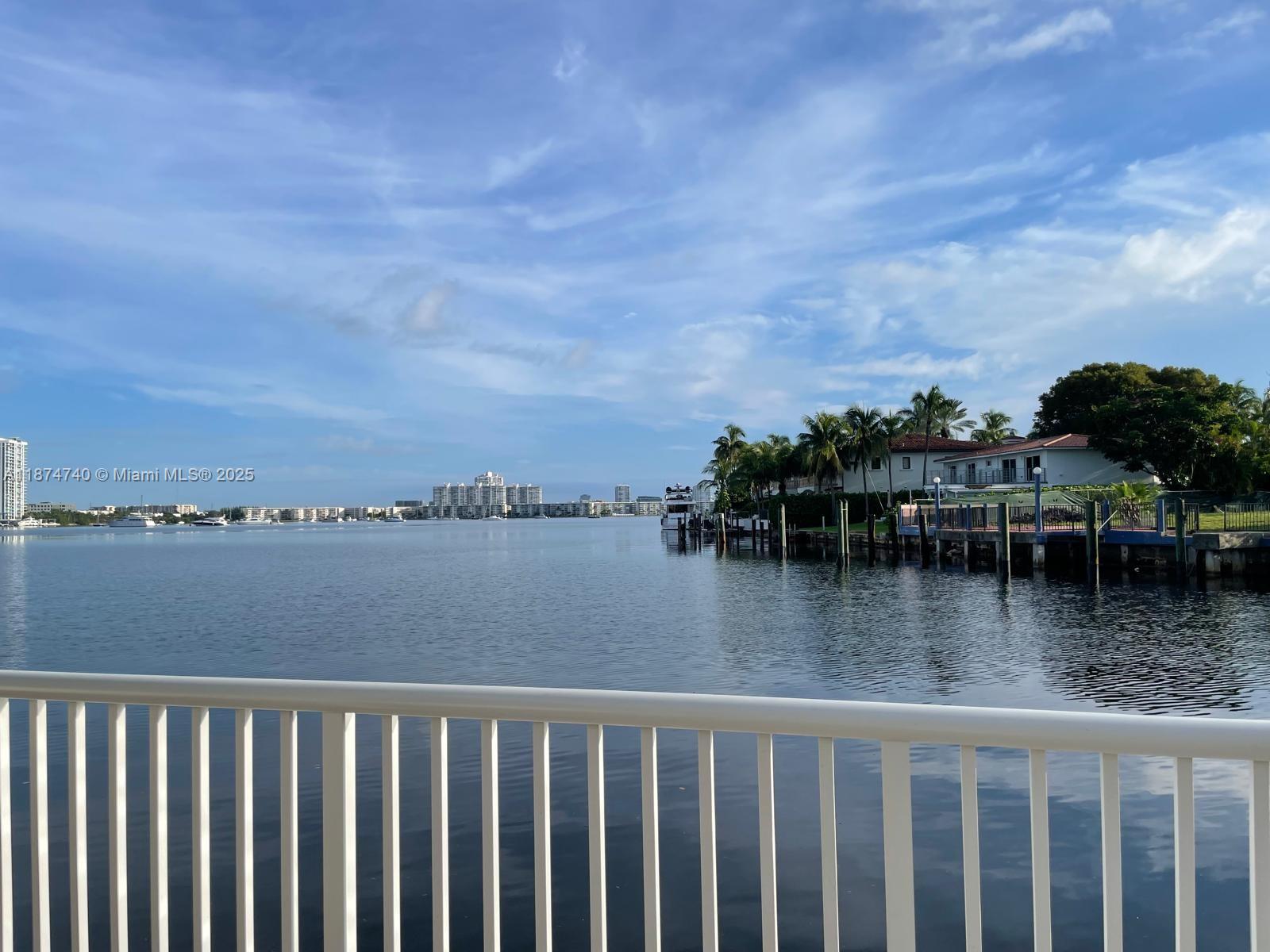 Spacious and bright 2/2 corner unit in building located in between the Intracoastal Waterway and Maule Lake. This larger unit offers an open, airy layout with plenty of natural light. The pool over looks the waterway and there is a nice large area you can reserve for entertaining. Well maintained building with 40 & 50 year certifications and SIRS completed. Strong management team in place, giving you a peace of mind while you enjoy the best of coastal living. Just 1.5 miles to Sunny Isles beach, walking distance to top restaurants, grocery stores, shopping, and entertainment. The balcony over looks the Oleta State Park that is across the street, which offers plenty of recreational activities.