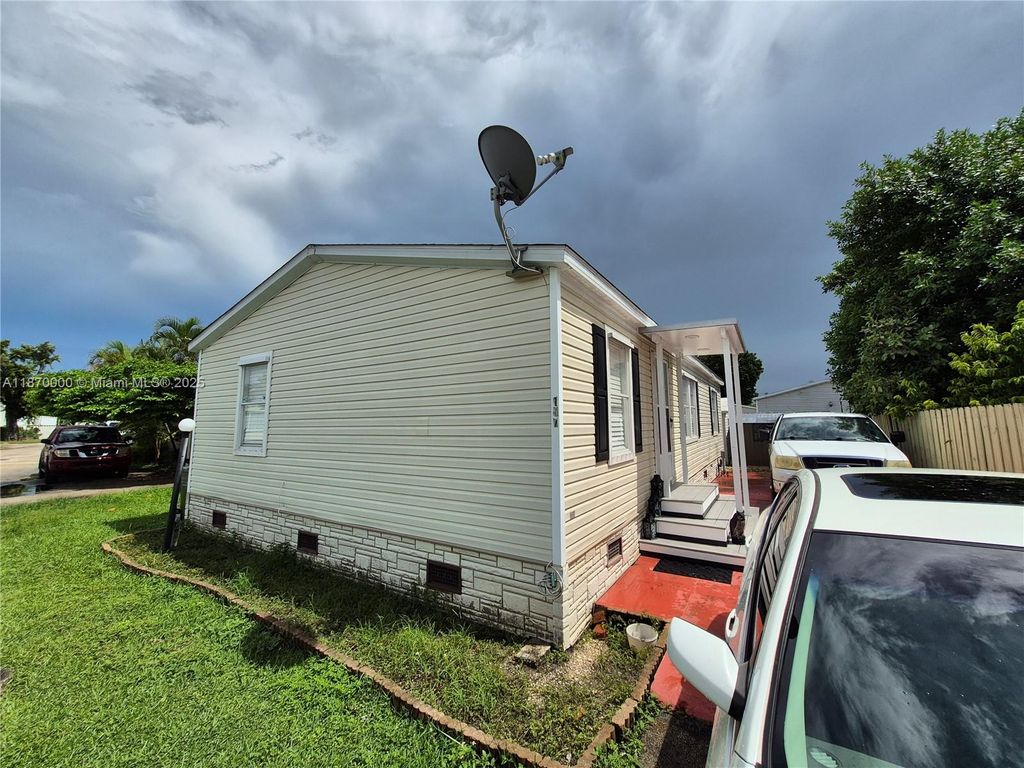 Photo of 220 NE 12th Ave Unit 157, Homestead, FL 33030 (MLS # A11870000)