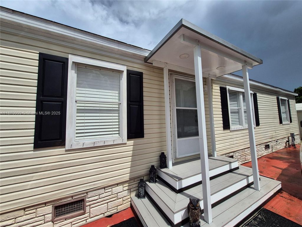 Photo of 220 NE 12th Ave Unit 157, Homestead, FL 33030 (MLS # A11870000)