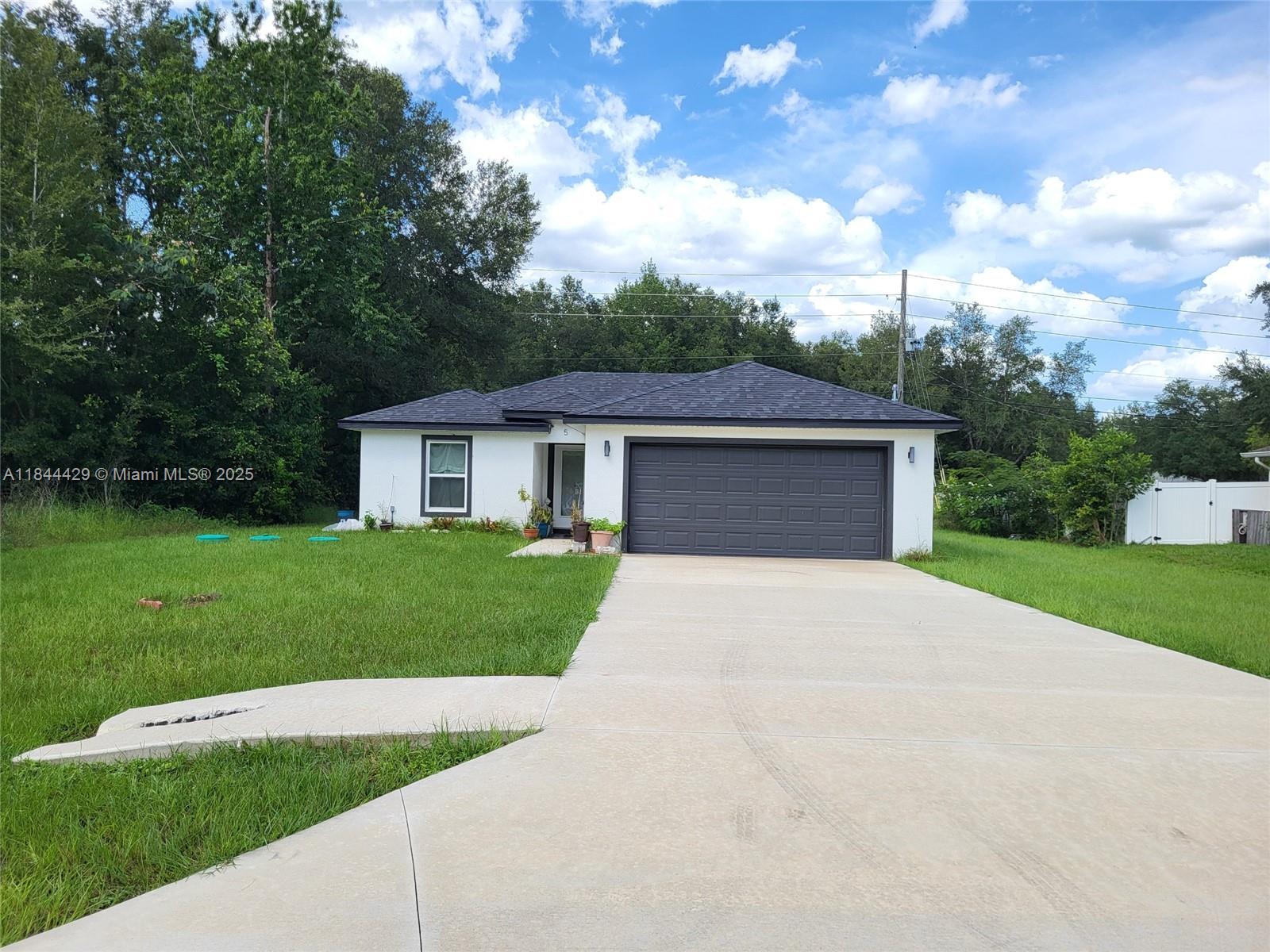 GORGEOUS BRAND NEW ONE STORY HOME, WITH IMPACT WINDOWS, WATER FILTER INSTALLED, NO WATER BILL TO PAY.