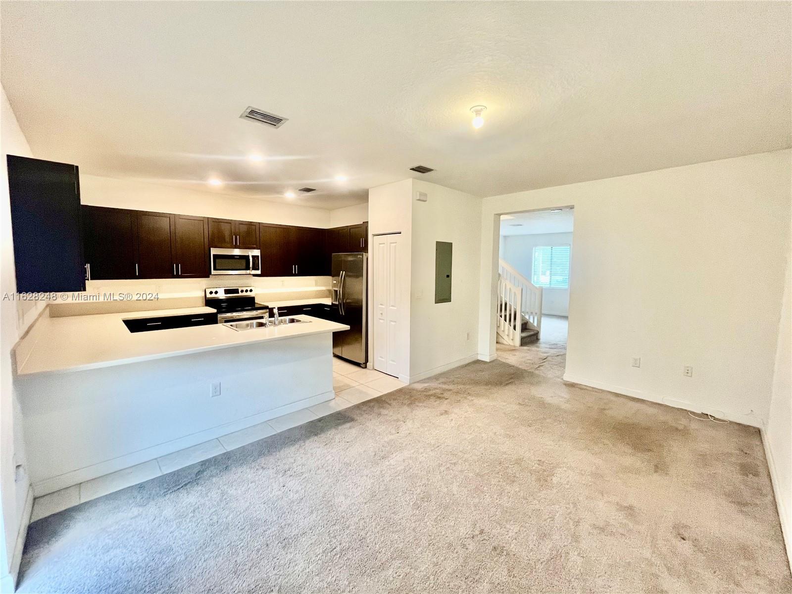 Charming two-story townhome featuring three bedrooms and three and a half bathrooms. This home includes a washer and dryer, two designated parking spaces, a patio, and a private balcony off the main bedroom upstairs. Conveniently located adjacent to the community pool and playground area.