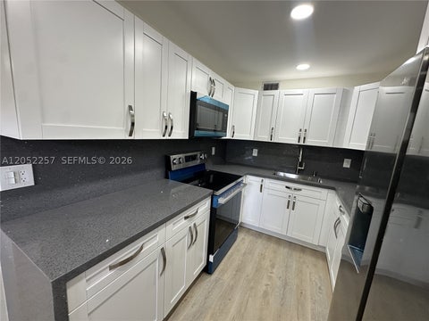 Photo of 13255 SW 7th Ct #113D, Pembroke Pines, FL 33027 (MLS # A12052257)