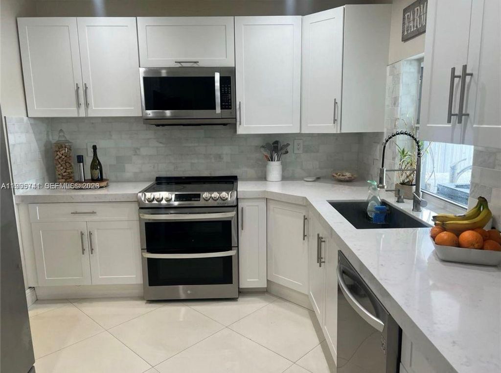 Photo of 7651 NW 14th St #7651, Pembroke Pines, FL 33024 (MLS # A11996741)