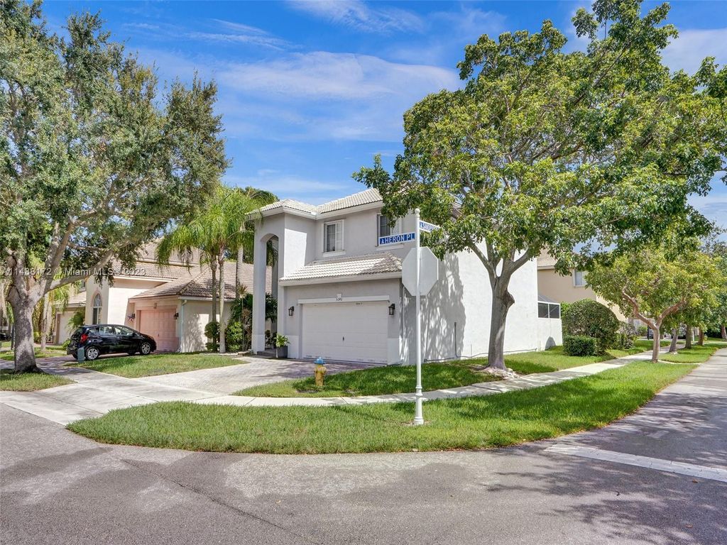 Photo of 5040 Heron Pl, Coconut Creek, FL 33073 (MLS # A11488172)