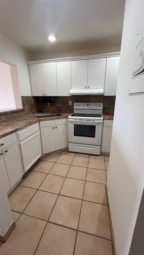 Photo of 6070 W 18th Ave #323, Hialeah, FL 33012 (MLS # A12000885)