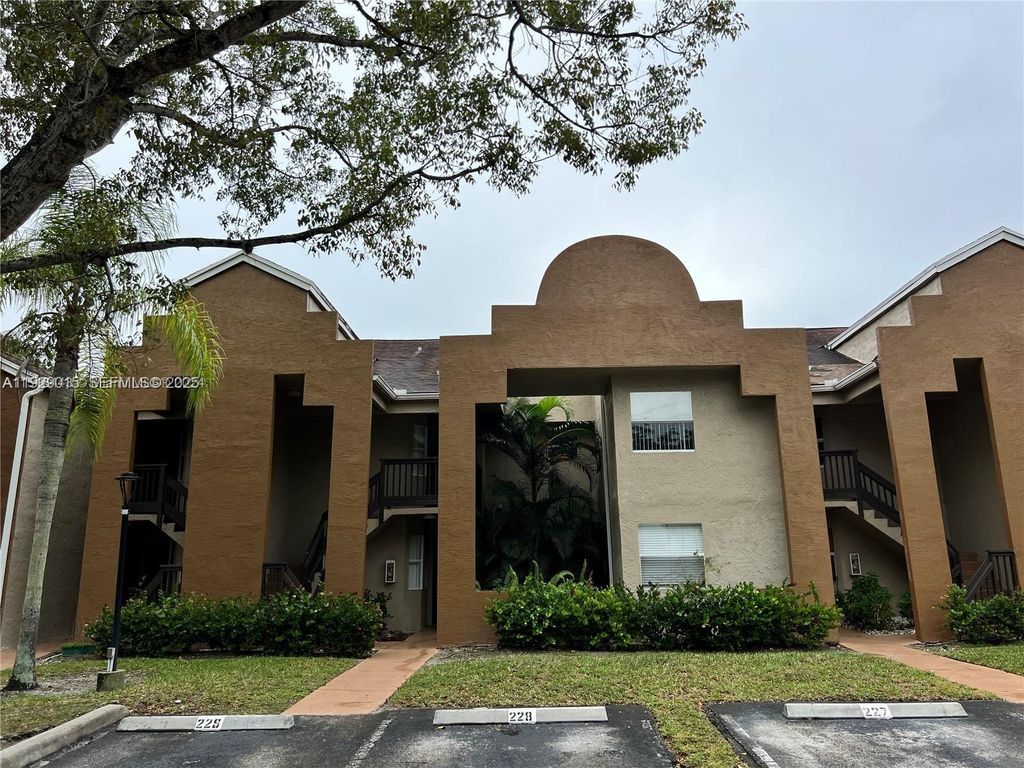 Photo of 665 SW 113th Way #665, Pembroke Pines, FL 33025 (MLS # A11929015)