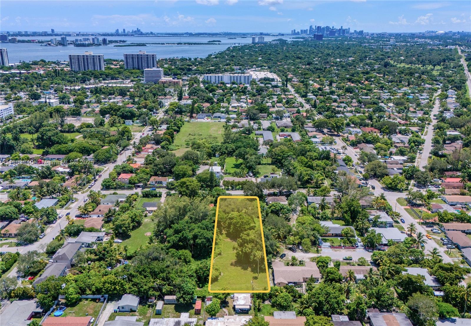 This newly rezoned infill site anchored between Biscayne Boulevard and the FEC rail line offers investors a rare ground-floor entry into Miami-Dade’s next sleeping-giant growth pocket, the 0.98-acre site was recently rezoned from RU-2 to MCD (Mixed-Use Corridor District), paving the way for a true live-work-play program consistent with the County’s SMART Plan vision for transit-oriented growth.
Plans-in-progress outline a six-story, 84,796 SF mixed-use complex with 75 residential units, 11,000 SF of commercial space, and 75 at-grade parking spaces, emphasizing efficient two-bedroom / 2 bath layouts of 800 SF each.