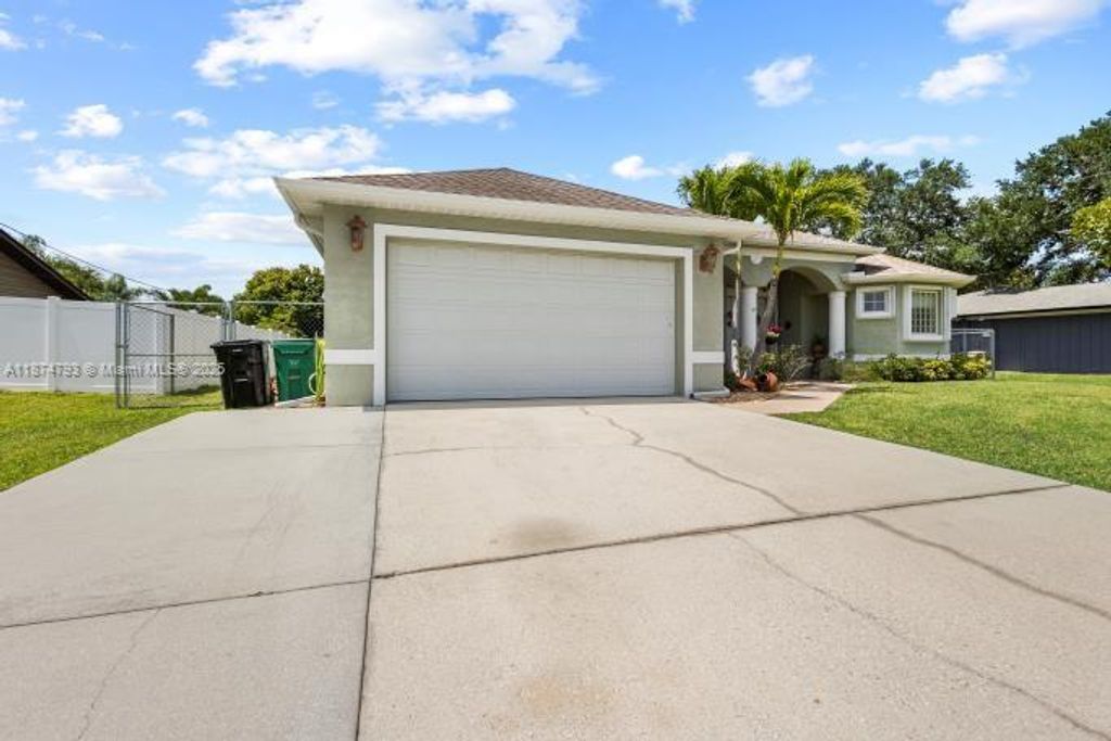Photo of 2532 SE Leithgow St, Port St Lucie, FL 34952 (MLS # A11874793)
