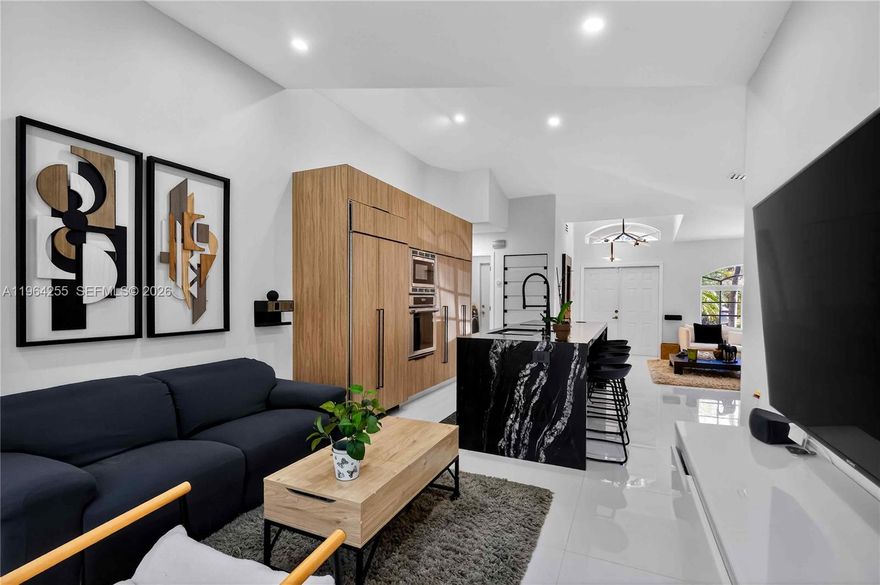 FULLY REMODELED OPPORTUNITY IN PEMBROKE PINES! This impeccable single-story residence stands out for its luxury upgrades and exceptional maintenance. It features a 2020 ROOF and NEW A/C for ultimate peace of mind. The chef-inspired kitchen is equipped with a high-end Sub-Zero refrigerator and induction stove. Additionally, the garage has been professionally remodeled and includes its own air conditioning. Private backyard: a tranquil oasis with no rear neighbors bordering a protected greenbelt, offering unmatched privacy.

Enjoy a resort-style lifestyle with a community pool and tennis, all with one of the lowest HOA fees in the area. This home perfectly combines modern luxury, efficiency, and a strategic location. Won’t last!