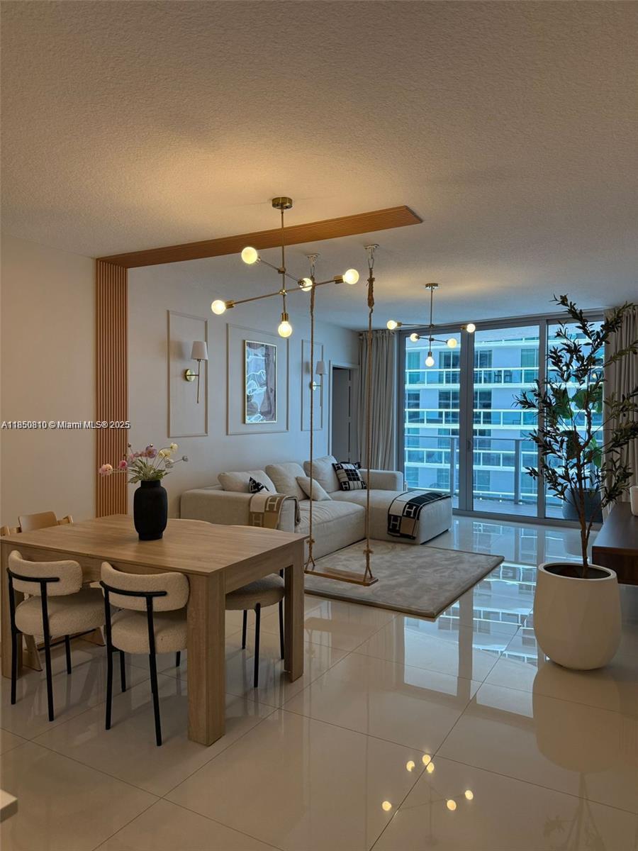 This beautifully furnished 3-bedroom, 3-full bathroom apartment at luxurious Aria on the Bay offers breathtaking water views, refined interiors, and a lifestyle that blends comfort, wellness, and convenience. Surrounded by fitness-friendly amenities, green spaces, and health-conscious cafes. Ideal for someone who values wellness, tranquility, and an upscale lifestyle in the heart of the city. Fully furnished with tasteful, modern d?cor, Bosch
appliances and Italian cabinetry. Don?t miss this opportunity to live in one of Miami?s most desirable neighborhoods with everything at your doorstep.