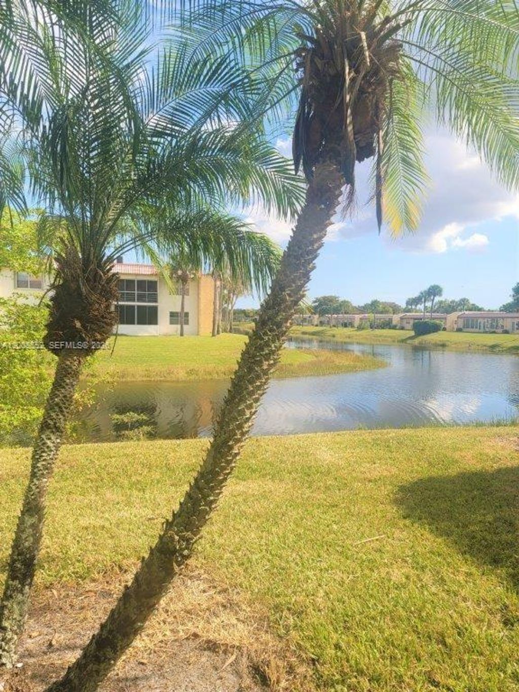 Photo of 1522 Lake Crystal Dr #C, West Palm Beach, FL 33411 (MLS # A12008552)