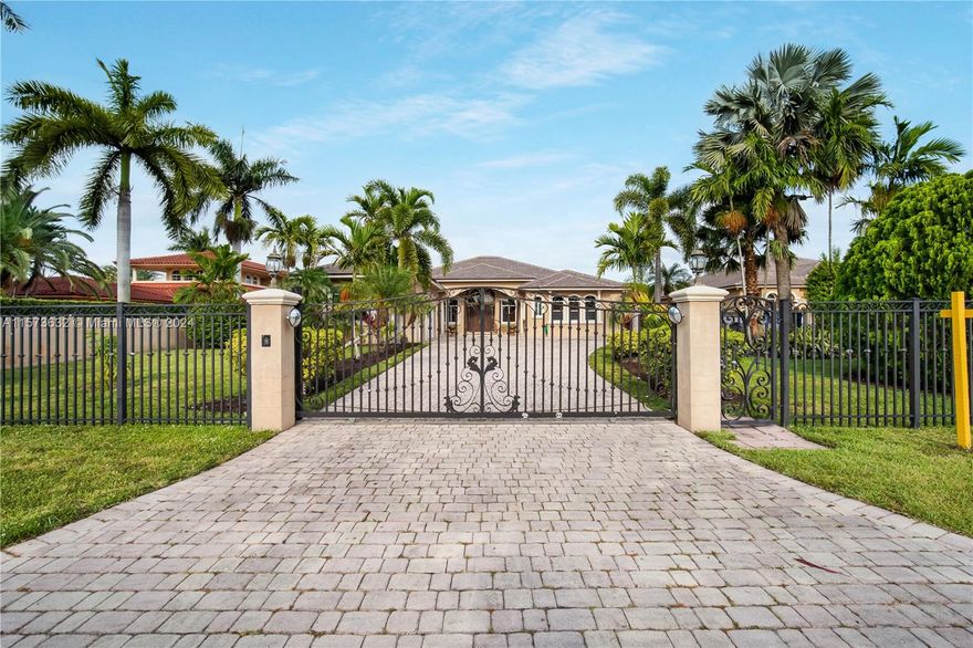 Welcome to your private oasis in a serene neighborhood! This expansive single-family home sits on a 30,492 s/f lot, enclosed by a concrete wall for ultimate privacy. Boasting 6 bedrooms, 4.5 bathrooms, and a 3-car garage, this 6,585 s/f residence exudes luxury. Inside, marble floors, high ceilings, and detailed molding create an elegant atmosphere. Recent upgrades include a new roof and three air conditioning units, ensuring comfort and peace of mind. Step outside to enjoy the resort-style pool with spa, surrounded by lush landscaping. A detached gazebo with an outdoor kitchen, bedroom, and bathroom provides the perfect space for outdoor entertainment.
With its prime location and luxurious amenities, this home offers the perfect blend of sophistication and tranquility.