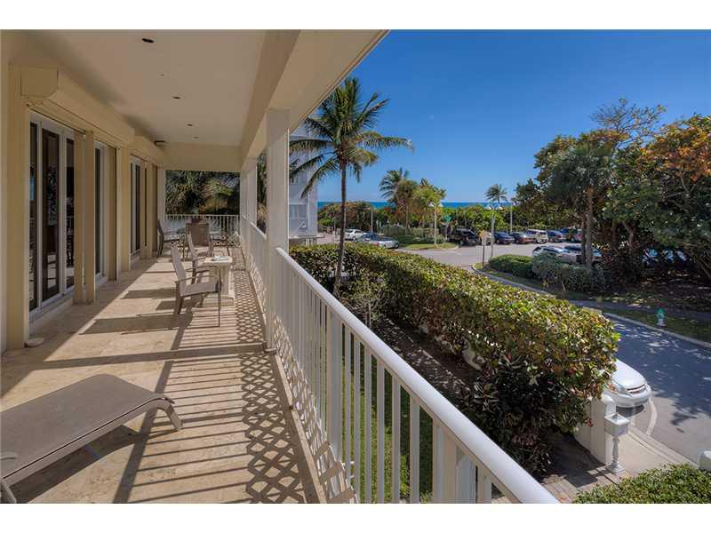 Immaculate 2story Beach-House built in 2001 w/ocean views. Double Lot. Steps from quiet Hollywood Boardwalk.  3bed + Converted Office. Travertine marble floors downstairs, maple finish wood floors upstairs, maple wood kitchen cabinets, top of the line fix tures/appliances, granite counter tops, custom designed office w/built-ins & corian tops. Hurricane impact windows/doors, 12 Ft ceilings, intercom/music system, elevator & dumb waiter.  $20K Generator. Plenty of Parking/room for pool. Best ocean views.