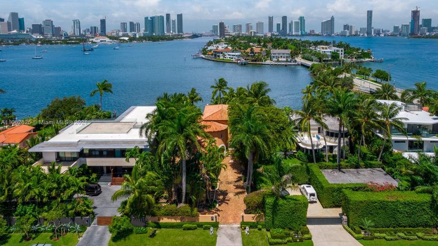 Enchanting Mediterranean estate located in the prestigious Venetian Islands, offering pristine open bay views of the Miami skyline. This 5 bedroom, 4.5 bathroom residence is situated on an impressive 10,500 sf lot with over 60 ft of water frontage. The gorgeous pool leads to a 40 ft dock & electric boat lift with no fixed bridges. Current master bedroom terrace boasts stunning sunset views overlooking the city. Perfect opportunity to renovate or build your dream home in paradise.