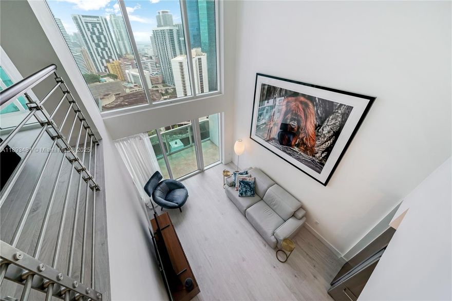 Discover a blend of minimalism and luxury in Brickell with this stunning 2-story art loft. Enjoy captivating views of the Miami River, Biscayne Bay, Miami Beach & Downtown. Boasting the largest floor plan in the building, featuring 2 terraces and plenty of storage. Floor-to-ceiling impact windows offer abundant natural light. Light flooring, crafted and imported from Switzerland, adorns the entire space. Premium appliance package includes KitchenAid appliances and Miele W/D. 30-day minimum rentals. Five-star amenities, 24-hour concierge, security, 2 heated pools, spa, fitness & business center. Great location next to Brickell City Centre, metro mover, shops and restaurants.