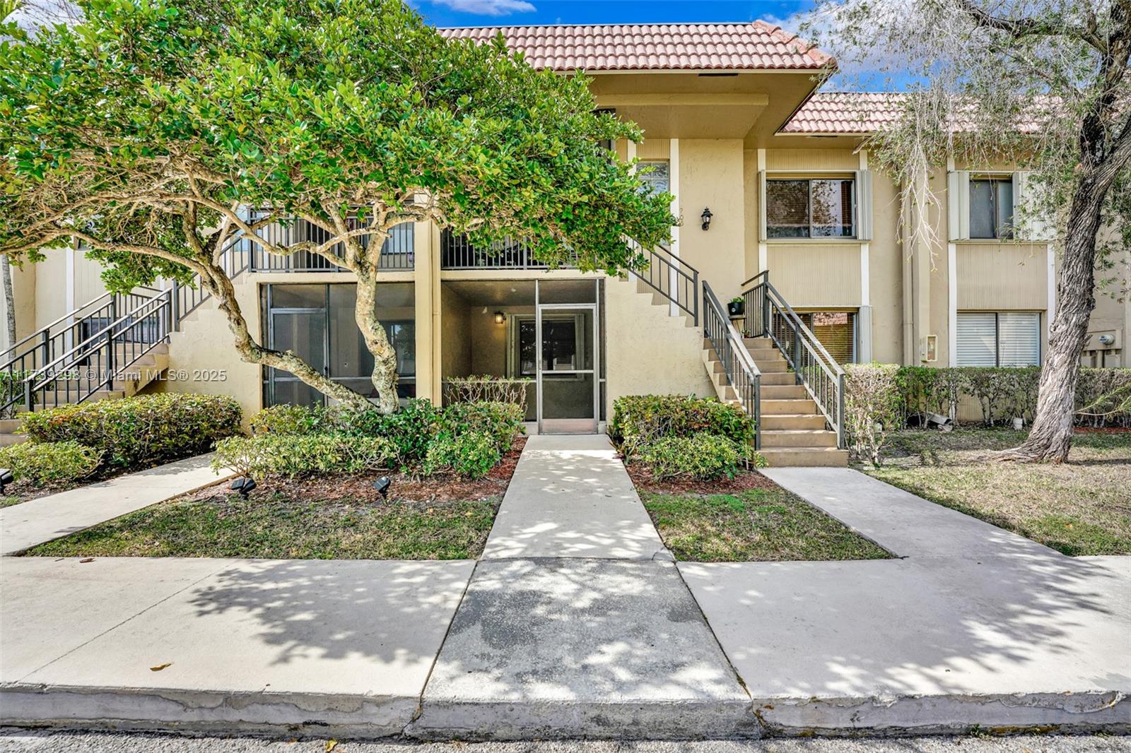 Discover this spacious and well-priced 2-bedroom, 2-bathroom corner unit in the heart of Weston, FL—one of Broward County’s most desirable areas. Featuring modern finishes, high ceilings, and abundant natural light, the unit boasts a granite kitchen with wood cabinets, a breakfast bar, and new stainless steel appliances being installed soon. The master bedroom includes a walk-in closet and tub, while in-unit laundry and a screened balcony add convenience. Tile flooring throughout, a replaced roof (2023), one assigned parking space, and ample guest parking. Weston offers top-rated A+ schools like Cypress Bay High and Eagle Point Elementary, as well as access to Bonaventure’s private club with pools, a gym, tennis courts, bowling, and more.