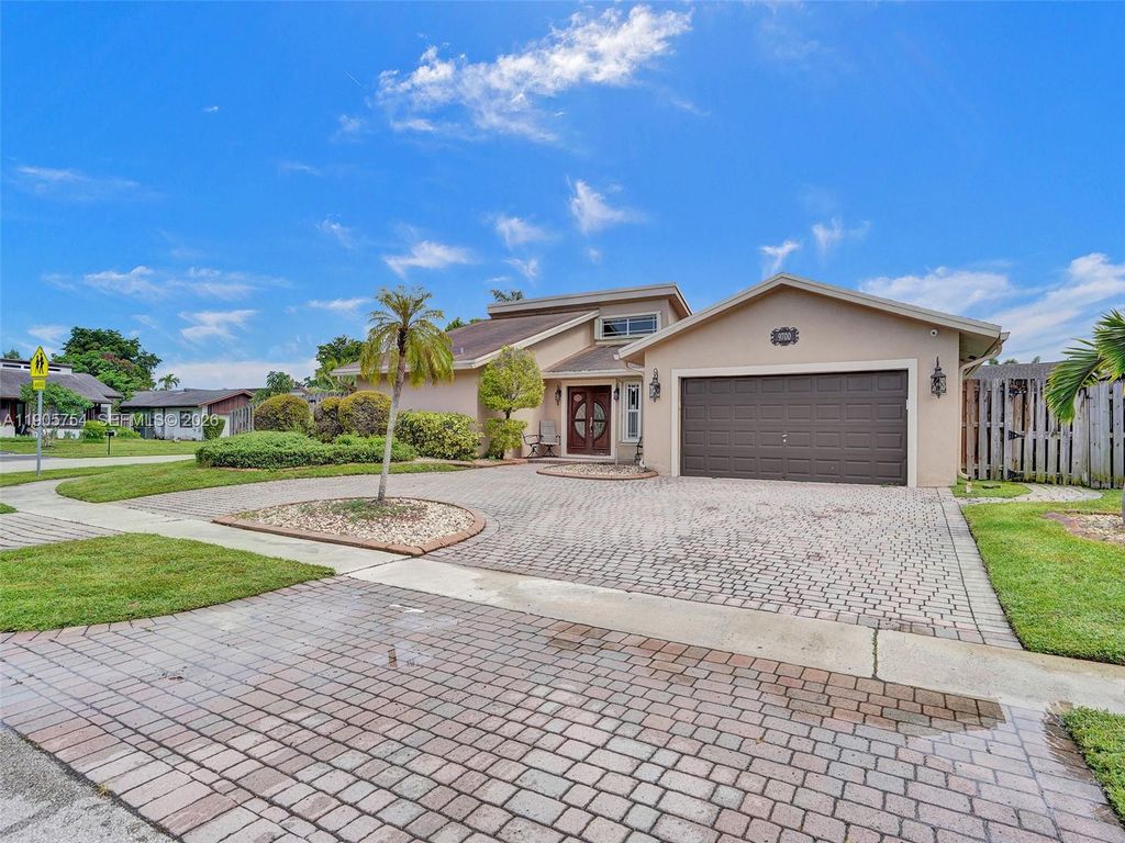 Photo of 9700 NW 33rd St #9700, Sunrise, FL 33351 (MLS # A11905754)