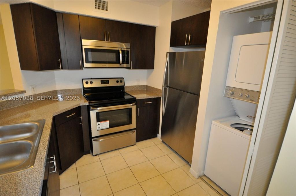 Photo of 3473 NW 44th St #103, Oakland Park, FL 33309 (MLS # A12037028)