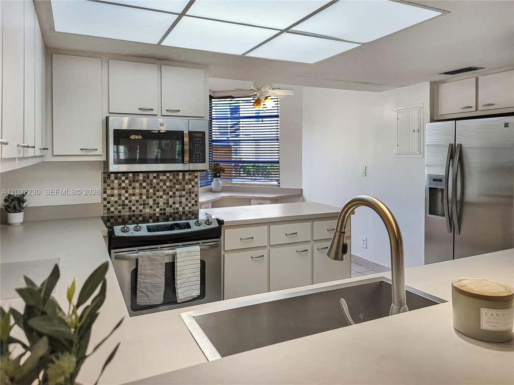Photo of 9531 Seagrape Dr #108, Davie, FL 33324 (MLS # A12032230)