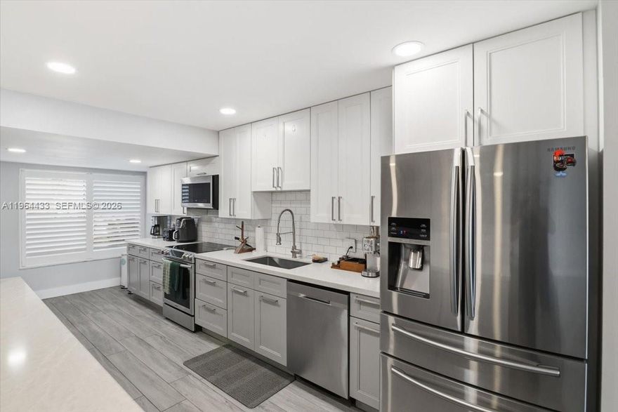 Spacious lakefront townhome offering the feel of a single-family residence within the well-established Trellises community in Plantation.

This renovated 3-bedroom + den, 2.5-bath home spans over 2,100 sq ft of thoughtfully designed living space, featuring open interiors, abundant natural light, and tranquil water views. The modern kitchen, updated finishes, and functional layout create a seamless blend of comfort and style.

The primary suite enjoys peaceful lake exposure and generous closet space, providing a private retreat within the home.

Trellises is known for its mature landscaping, security patrol, and resort-style amenities including pool, tennis courts, clubhouse, fitness center, and scenic green spaces. Two assigned parking spaces directly in front of the residence. HOA covers water, trash, basic cable TV, and roof insurance.

Designed for owner-occupants who value space, serenity, and community living.
Minimum 25% down payment required

?? Click on the Virtual Tour to experience a detailed, room-by-room walkthrough and fully appreciate the layout, light, and lake views.