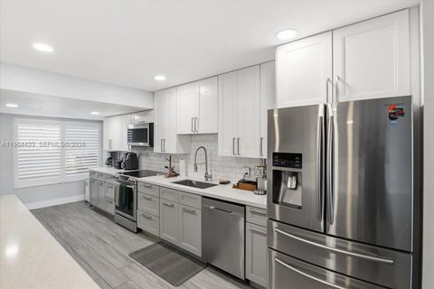 Photo of 958 Mockingbird Ln #514, Plantation, FL 33324 (MLS # A11964433)