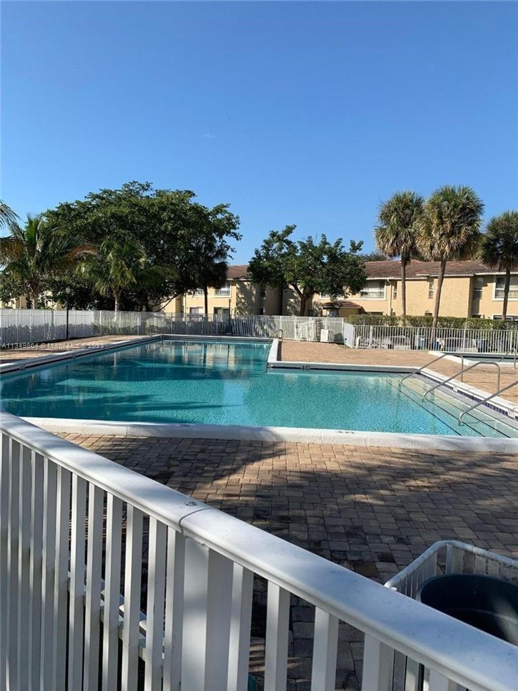 Photo of 1006 Twin Lakes Dr #20-E, Coral Springs, FL 33071 (MLS # A11349864)