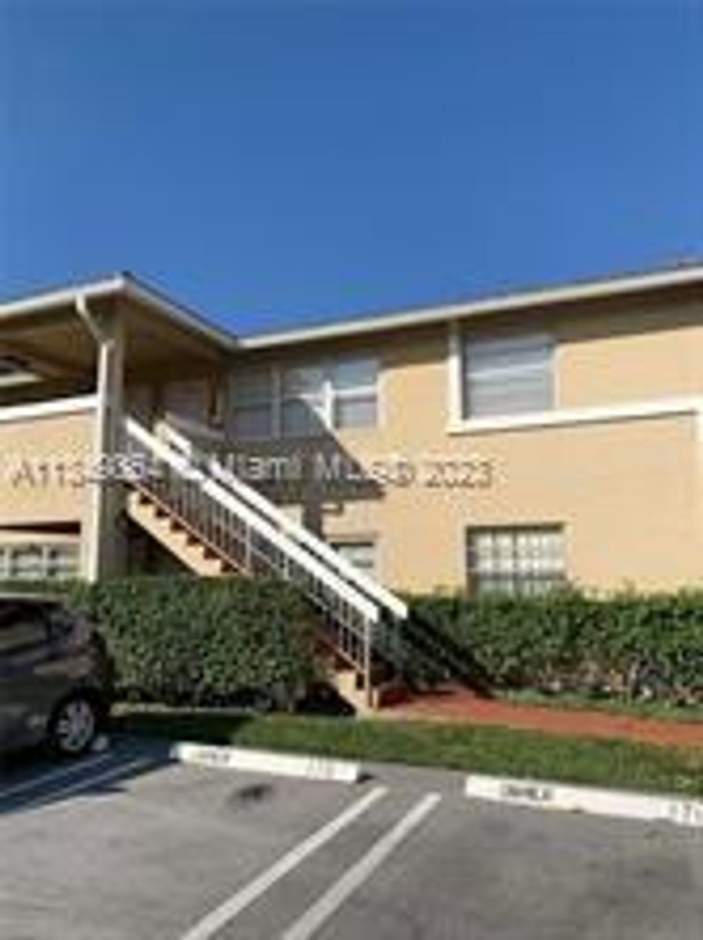 Photo of 1006 Twin Lakes Dr #20-E, Coral Springs, FL 33071 (MLS # A11349864)