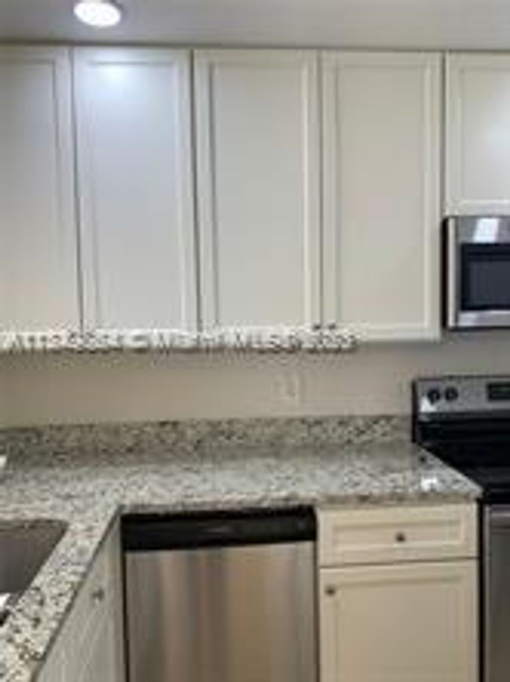 Photo of 1006 Twin Lakes Dr #20-E, Coral Springs, FL 33071 (MLS # A11349864)