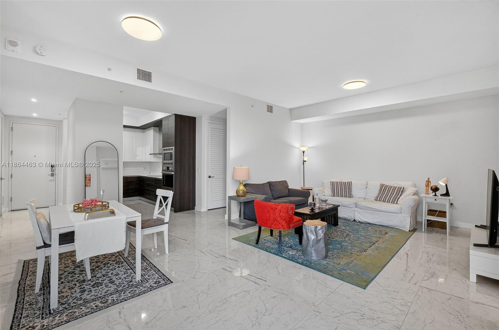 Discover luxury living in the heart of Coral Gables at Merrick Manor, directly across from The Shops at Merrick Park. This spacious 2-bedroom, 2.5-bathroom LOWER PENTHOUSE offers soaring ceilings and abundant natural light throughout. The residence features Italian flooring, premium Bosch appliances, a full-size washer/dryer, and a private balcony overlooking the pool—perfect for relaxing or entertaining.
Merrick Manor residents enjoy resort-style amenities, including a swimming pool, BBQ area, fitness center, 24-hour concierge, club lounge, news cafe lounge and business center. Steps away from world-class shopping, dining, and entertainment, this home combines elegance and convenience.