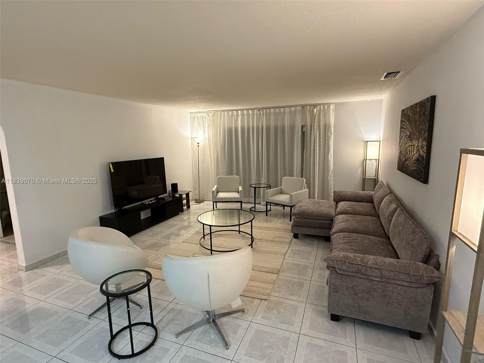 Discover this beautifully 3-bedroom, 2-bathroom residence situated on a prime 13,570 sq ft corner lot in Golden Shores, Sunny Isles Beach. With 2,111 of living space and a 2-car garage, this home blends comfort and value with modern design elements and tasteful furnishings. One of the few single-family neighborhoods in Sunny Isles, Golden Shores offers the privacy and space of a home with the lifestyle of a luxury beach destination. Enjoy a spacious layout, stylish finishes, and a central location just minutes from top schools, parks, beaches, and shopping. No HOA and no rental restrictions
