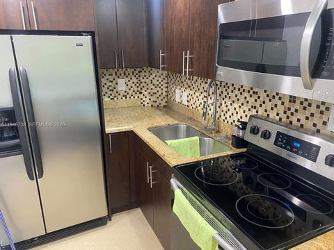 Photo of 6950 Miami Gardens Dr #2-402A, Hialeah, FL 33015 (MLS # A11946738)