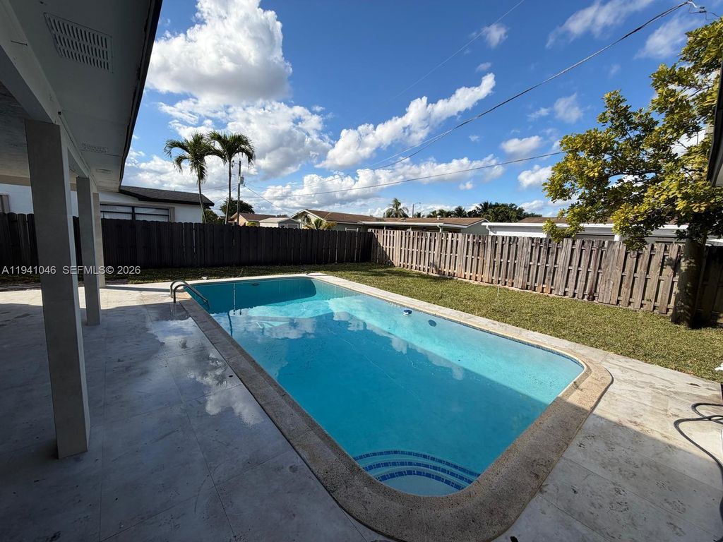 Photo of 10581 NW 28th Mnr, Sunrise, FL 33322 (MLS # A11941046)