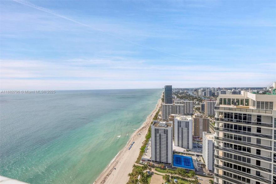 Breathtaking ocean and Intracoastal views await from this fully renovated 47th-floor residence at The Beach Club. This spacious 2-bedroom plus den, 3-bath home showcases elegant southeast exposures and upgraded electrical throughout. The primary suite features a luxurious Jacuzzi, while the European-style kitchen boasts sleek cabinetry and granite countertops. Enjoy world-class amenities, including a 40,000 sq. ft. full-service spa, state-of-the-art fitness center, on-site restaurant, bar with poolside service, and three resort-style pools. Residents also benefit from a full-time concierge and 24-hour valet parking for ultimate convenience.