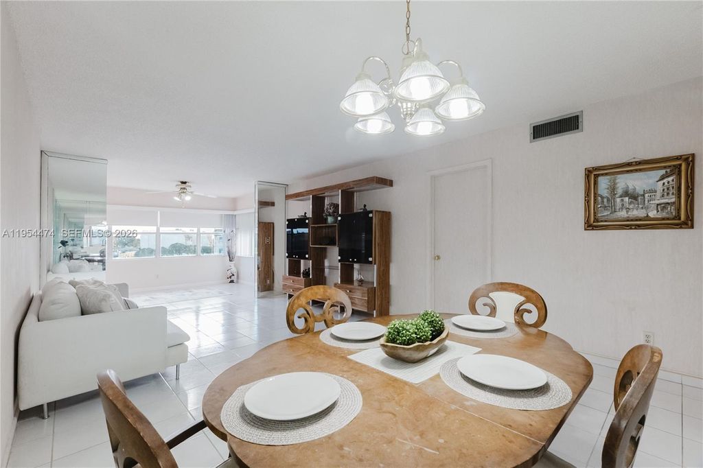 Photo of 9441 Sunrise Lakes Blvd #310, Sunrise, FL 33322 (MLS # A11954474)