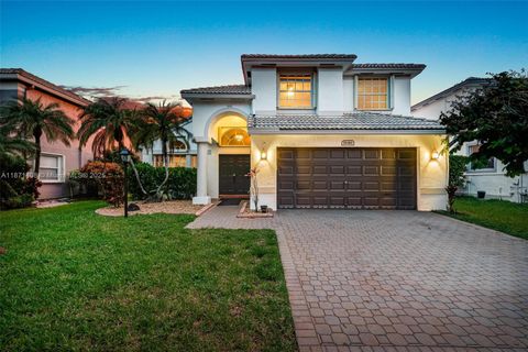 Photo of 1646 NW 144th Way, Pembroke Pines, FL 33028 (MLS # A11871408)