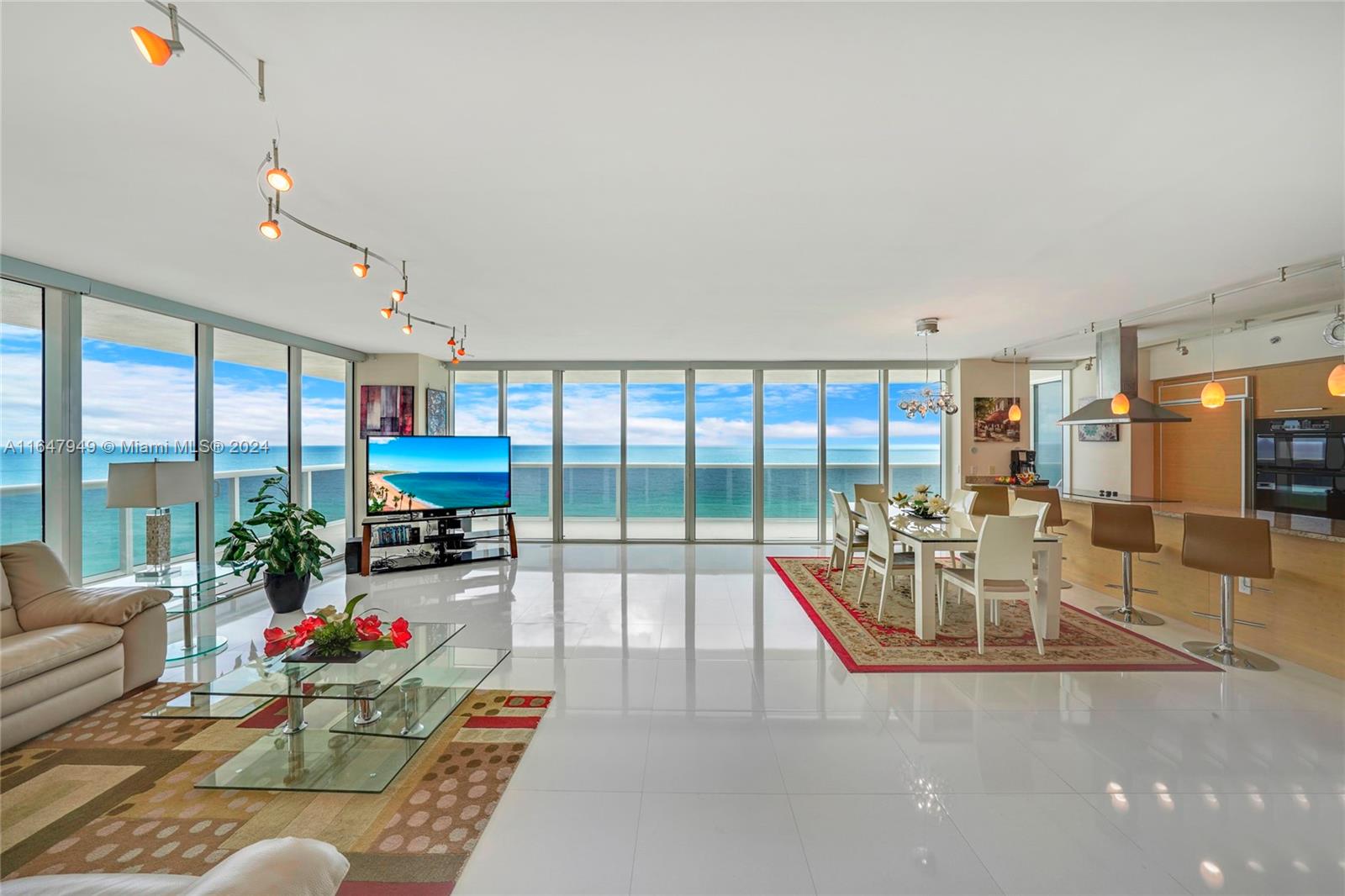 Beach Club Two’s most desired corner unit! Direct oceanfront views with three bedrooms and three baths. Throughout the condominium it has designer finishes including electric shades, limestone floors in the living and dining room area plus the second and third bedroom. Master suite has hardwood floors plus recessed lighting and to many other features to mention. This condominium is priced to sell for this holiday season