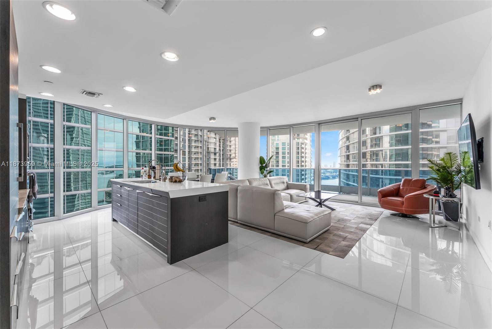 Live above it all at Epic Residences 3601—an ultra-luxurious 2-bed, 2.5-bath condo on the 36th floor featuring a Snaidero kitchen, Miele appliances, Sub-Zero fridge, custom closets, Italian tile floors, marble baths, and an 8-ft deep balcony with sweeping 180° views. Residents enjoy Joia Beach Club VIP membership, 15% off at Zuma, 3 pools, spa, gym, and fine dining. Perfectly located near Brickell, Whole Foods, and world-class entertainment. Financially secure with 100% reserves and no assessments. Seller seeks a 3–5 year leaseback at $7,500/month for Year 1, prepaid at closing as a credit, with future rent aligned to market—delivering investors immediate income and long-term appreciation with a stable tenant in place.