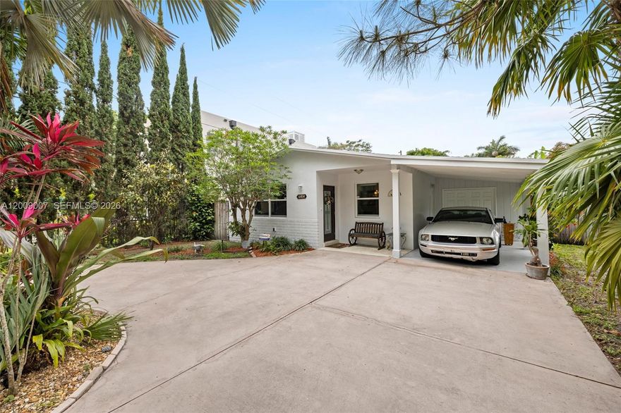 Charming 2-bedroom, 2-bath one-story “doll house” in the heart of South Miami! This well-maintained 1,080 SF home features beautiful terrazzo floors throughout and a versatile family room that can easily be converted back into a third bedroom. The updated kitchen boasts granite countertops and stainless-steel appliances. Additional highlights include a convenient carport, washer and dryer, and a newly installed wooden fence for quiet privacy in the back yard orchid garden. Circular driveway offers ample parking.  This sought-after location is the best residential neighborhood just minutes from excellent restaurants, chic South Miami shops, groceries, and parks. Easy access to primary highways makes this the ideal location, perfect for comfortable urban living!
