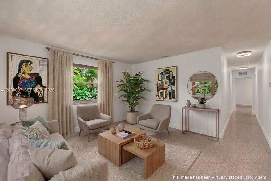 Charming 2-bedroom, 2-bath one-story “doll house” in the heart of South Miami! This well-maintained 1,080 SF home features beautiful terrazzo floors throughout and a versatile family room that can easily be converted back into a third bedroom. The updated kitchen boasts granite countertops and stainless-steel appliances. Additional highlights include a convenient carport, washer and dryer, and a newly installed wooden fence for quiet privacy in the back yard orchid garden. Circular driveway offers ample parking.  This sought-after location is the best residential neighborhood just minutes from excellent restaurants, chic South Miami shops, groceries, and parks. Easy access to primary highways makes this the ideal location, perfect for comfortable urban living!