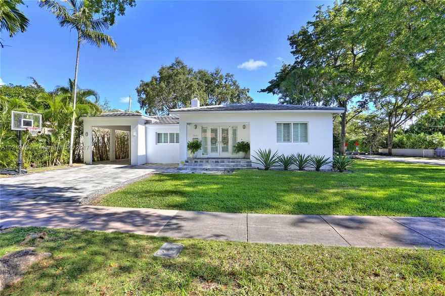 Absolutely exquisite w/ spectacular updates & additions! Contemporary style does not lose the original charm of wood flrs, art deco arches & fireplace, yet features sharp, white lines, impact windows & drs thruout, LED recessed lighting, gorgeous kit w/ eat-in counter opening to fam rm, master ste w/walk-in closet & beautiful ba w/ steam shower. Saline pool & jacuzzi & turf yard grace the back while location offers urban lifestyle people are looking for today w/ the warmth of a wonderful neighborhood.