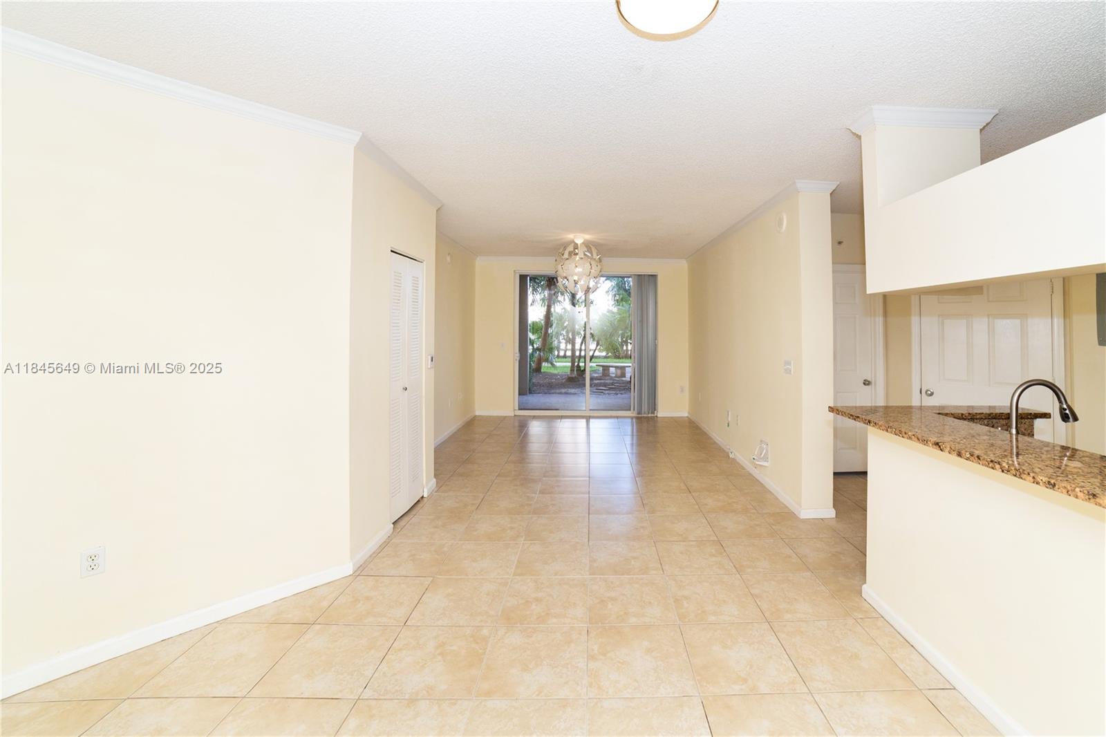 2-bedroom, 2-bath in the heart of Sunny Isles Beach, tile flooring, in-unit laundry, and an open-concept kitchen. The spacious primary suite offers a large bathroom with double sinks, a linen closet, and a walk-in closet, while the balcony provides garden views with space to dine or unwind. Enjoy resort-style amenities at Porto Bellagio, including two pools, a jacuzzi, a new gym, clubhouse, private promenade, and more. Covered, assigned parking included. Walking distance to the beach, shops, restaurants, and a top-rated K–8 school.