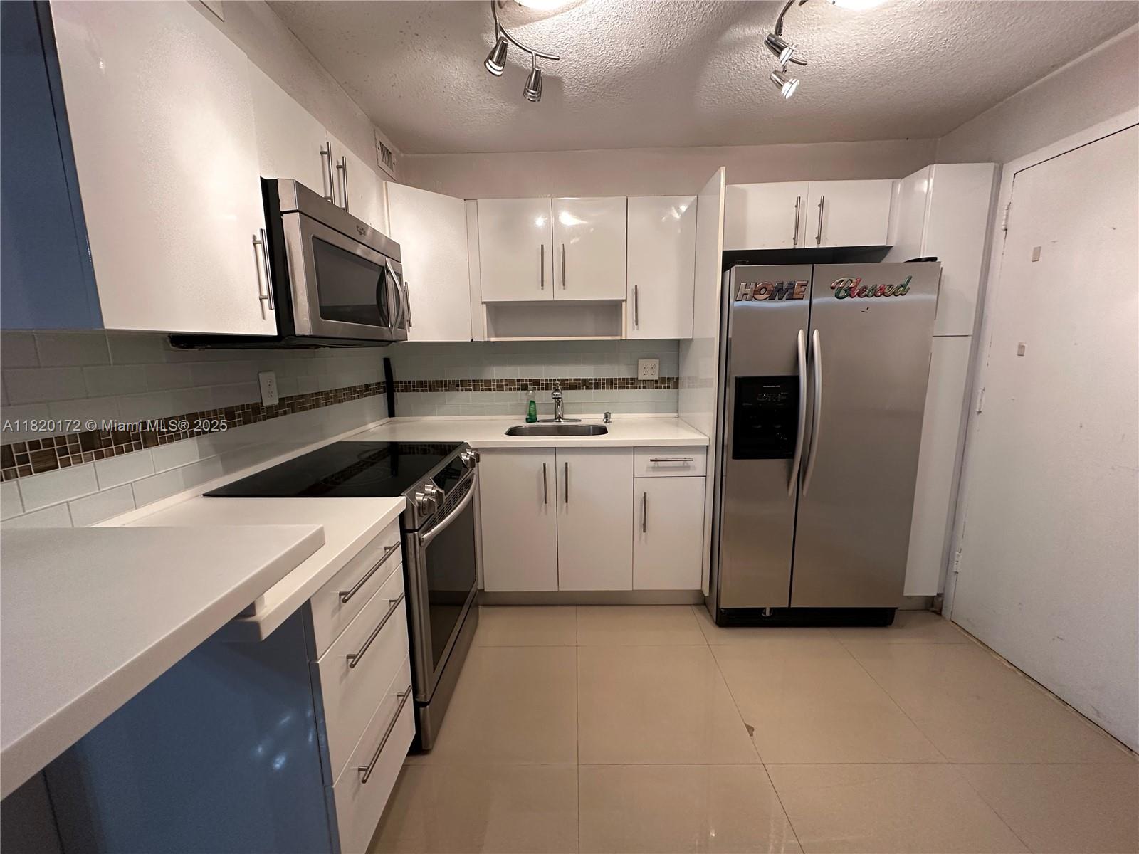 Property for Sale at 1470 Ne 125th Ter 308, North Miami, Miami-Dade County, Florida - Bedrooms: 1 
Bathrooms: 2  - $190,000
