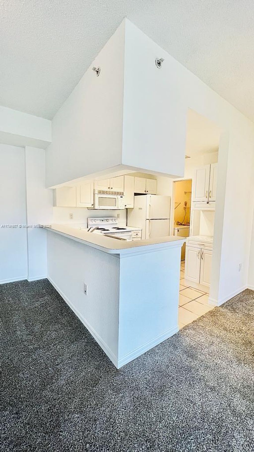 Photo of 2917 Tuscany Ct #304, Palm Beach Gardens, FL 33410 (MLS # A11741937)