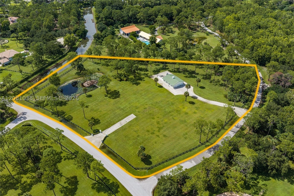 Photo of 14474 Caloosa Blvd, Palm Beach Gardens, FL 33418 (MLS # A12081038)