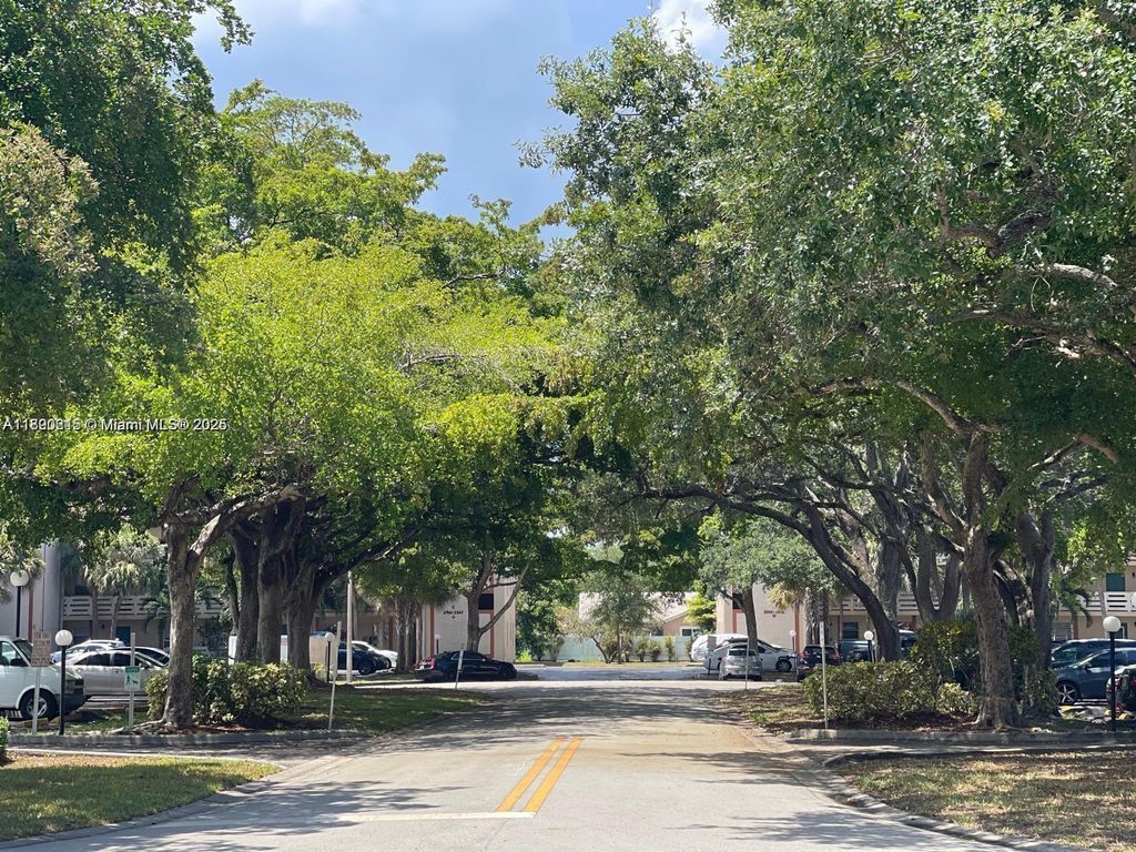 Photo of 3228 NW 102nd Ter #107-F, Coral Springs, FL 33065 (MLS # A11890215)