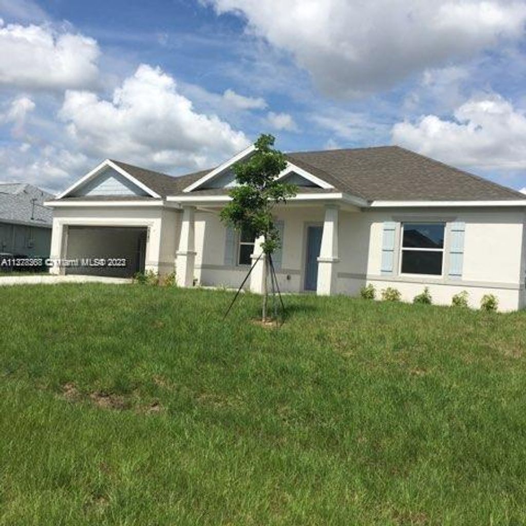Photo of 5787 NW Zinnia St, Port Saint Lucie, FL 34986 (MLS # A11378268)