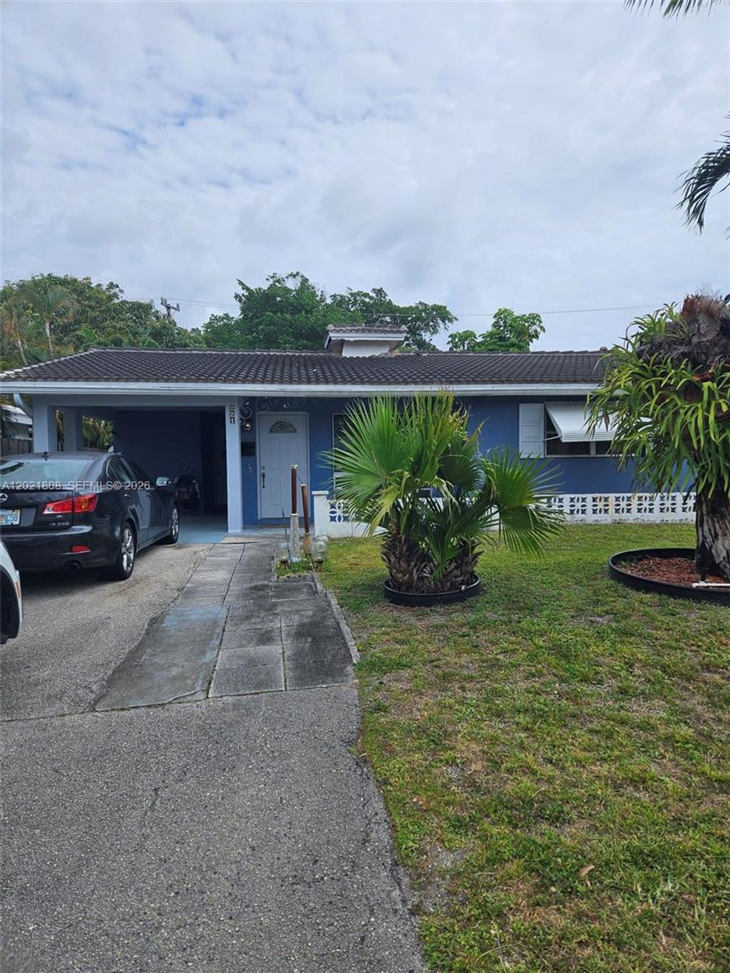 Photo of 221 NW 46th Ct, Oakland Park, FL 33309 (MLS # A12021808)