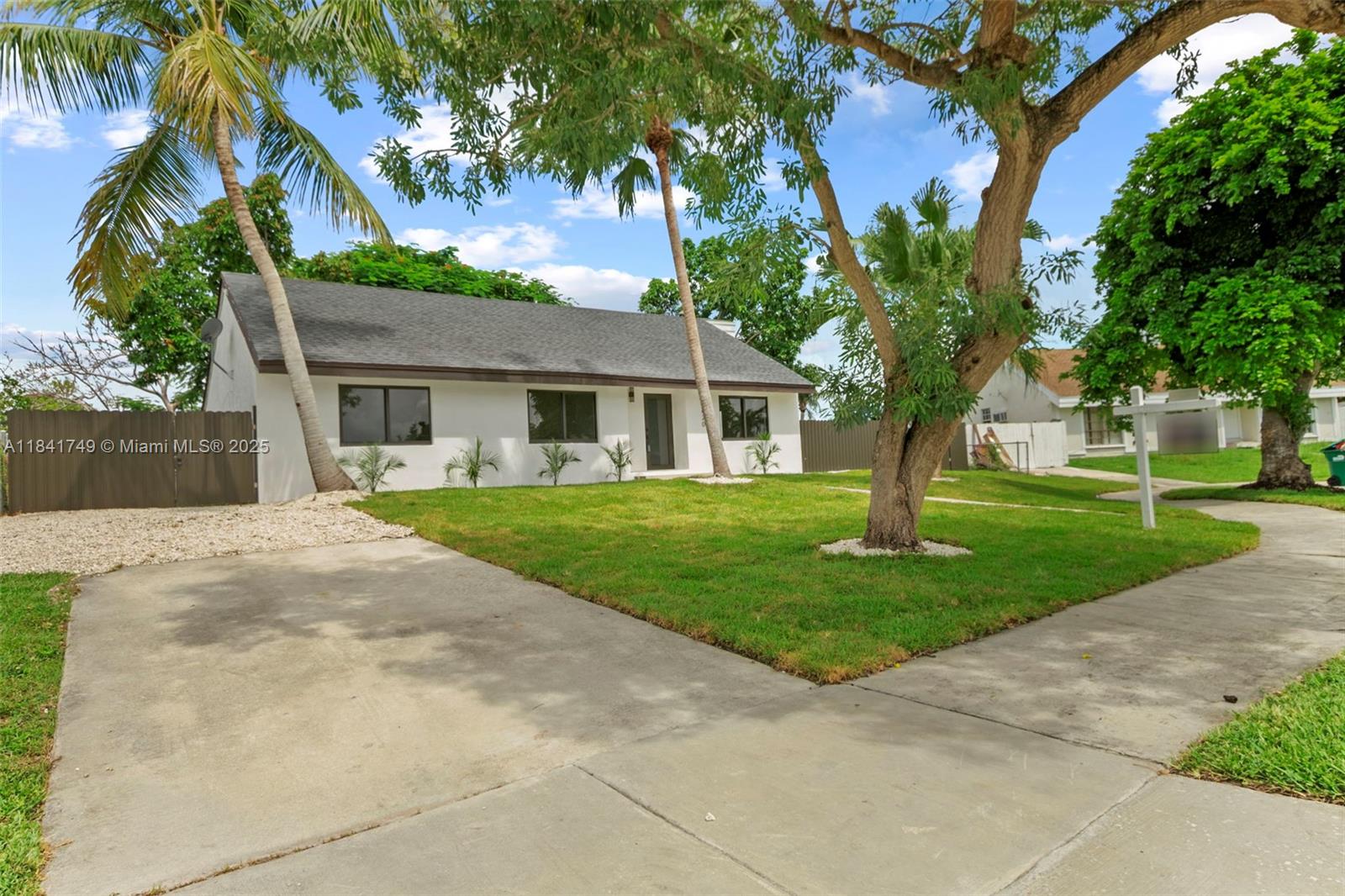Step into this COMPLETELY and NEWLY RENOVATED 3-bed, 2-bath home, with an extra room, where modern design meets peace of mind. This turnkey property features BRAND NEW impact windows and doors, NEWER roof, NEW lush green grass throughout, NEW electrical panel, NEW fence, NEW PVC flooring, a tranquil canal view, & enough space for a Boat and RV. Inside, you'll find stylish NEW flooring throughout, a BRAND NEW kitchen with all-NEW cabinetry, countertops, and appliances, as well as BRAND NEW bathrooms. Located in an excellent and convenient area, this home has quick access to major highways, including the Florida Turnpike and US-1. close to top-rated schools, supermarkets, shopping centers, restaurants, parks, Black Point Marina, etc. Its proximity to all makes it perfect for everyday living
