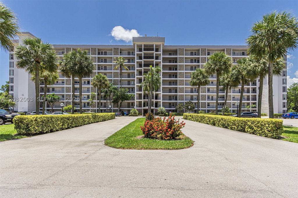 Photo of 3150 N Palm Aire Dr #705, Pompano Beach, FL 33069 (MLS # A12032003)